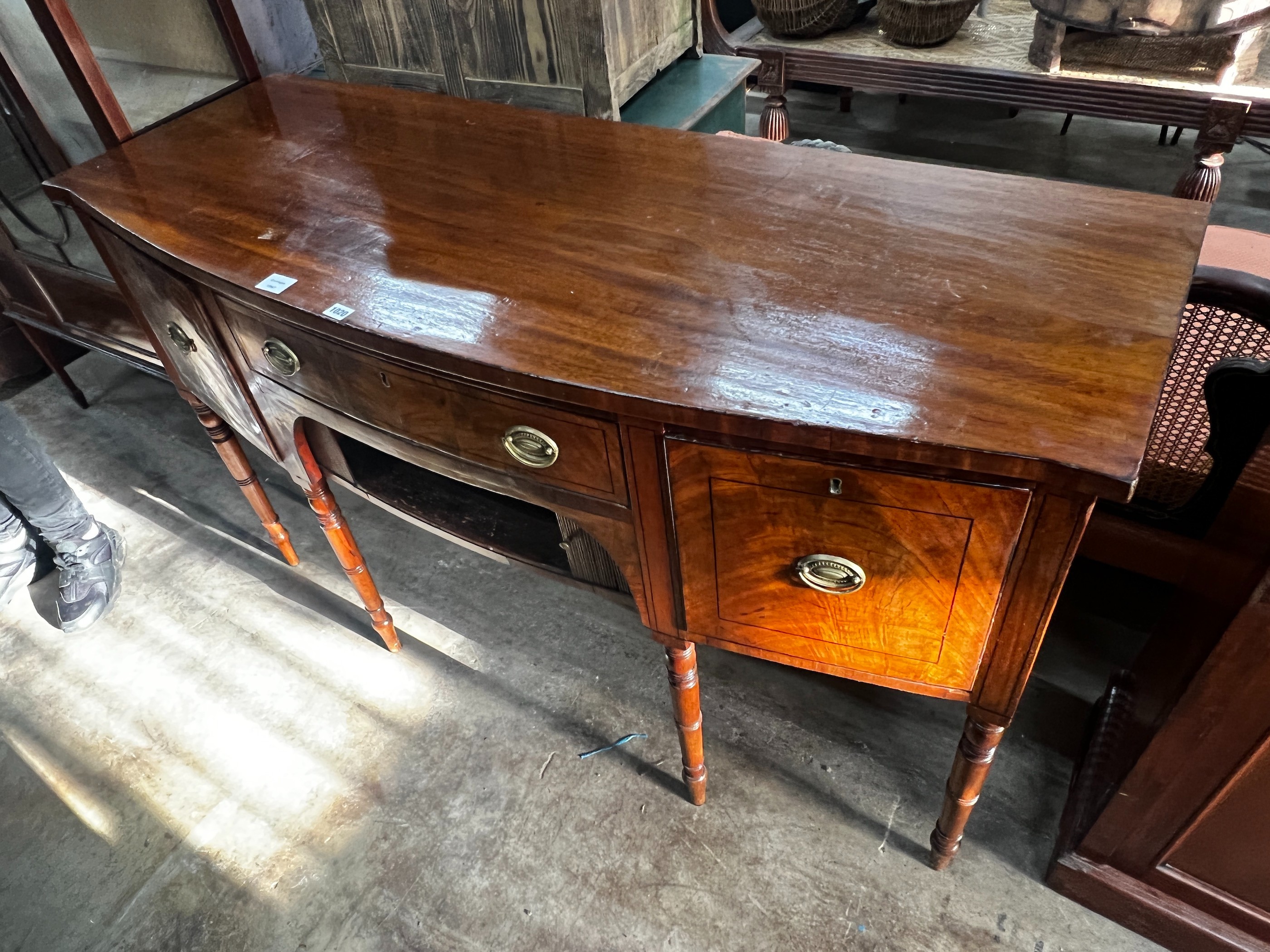 A Regency mahogany bowfronted sideboard, length 153cm, depth 58cm, height 92cm